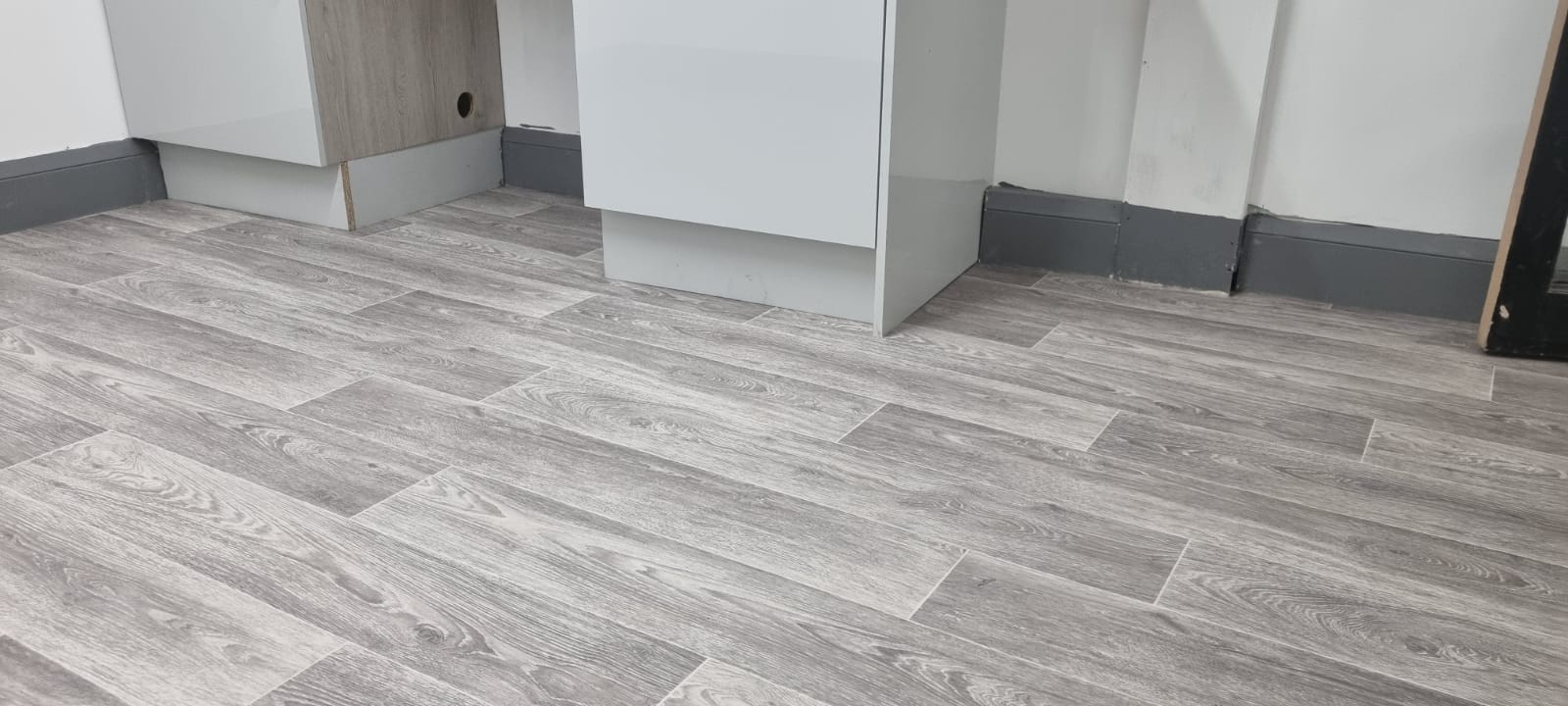 An interior setting showcasing vinyl, SPC, LVT, and laminate flooring options from Carpet Style Nottingham.