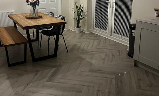 Comparison of vinyl, SPC, LVT, and laminate flooring options at Carpet Style Nottingham.