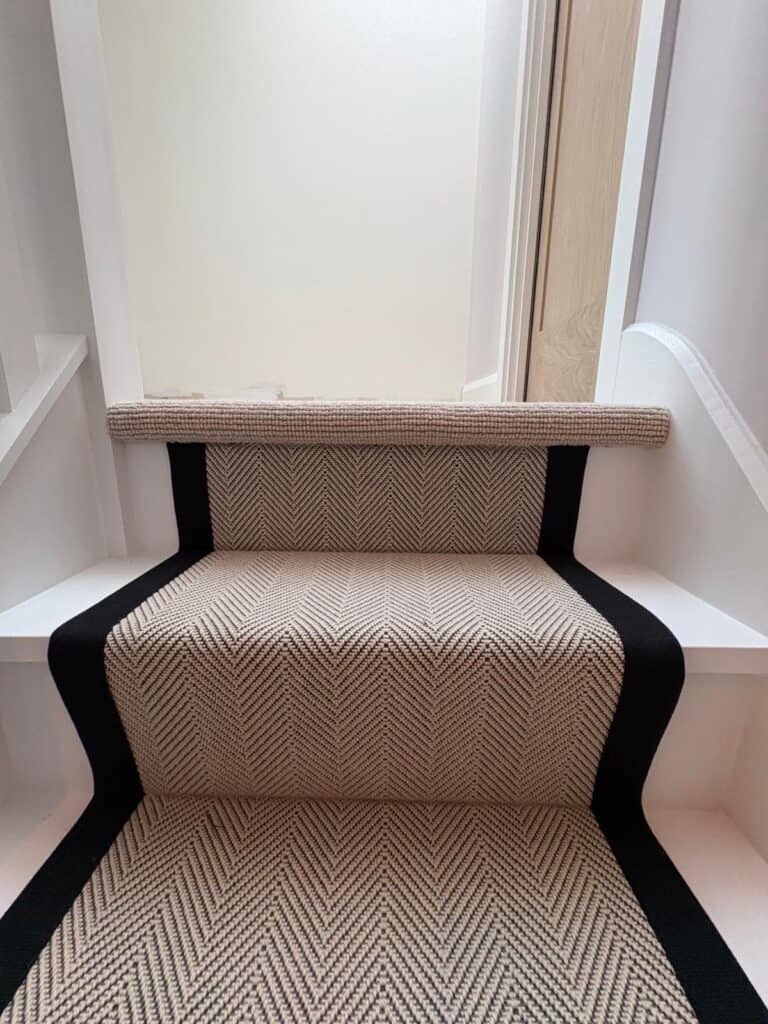 Brockway Gatsby stair runner with bound black edges fitted by Carpet Style