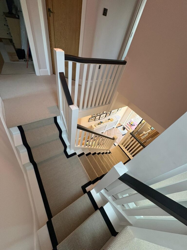 Brockway Gatsby stair runner installation showing the carpet running down a contemporary staircase, fitted by Carpet Style
