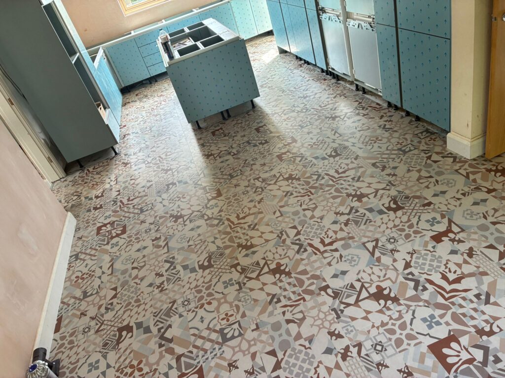 Karndean Marrakesh SP220 patchwork LVT floor fitted in a family kitchen