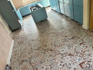 Karndean Marrakesh SP220 patchwork LVT floor fitted in a family kitchen